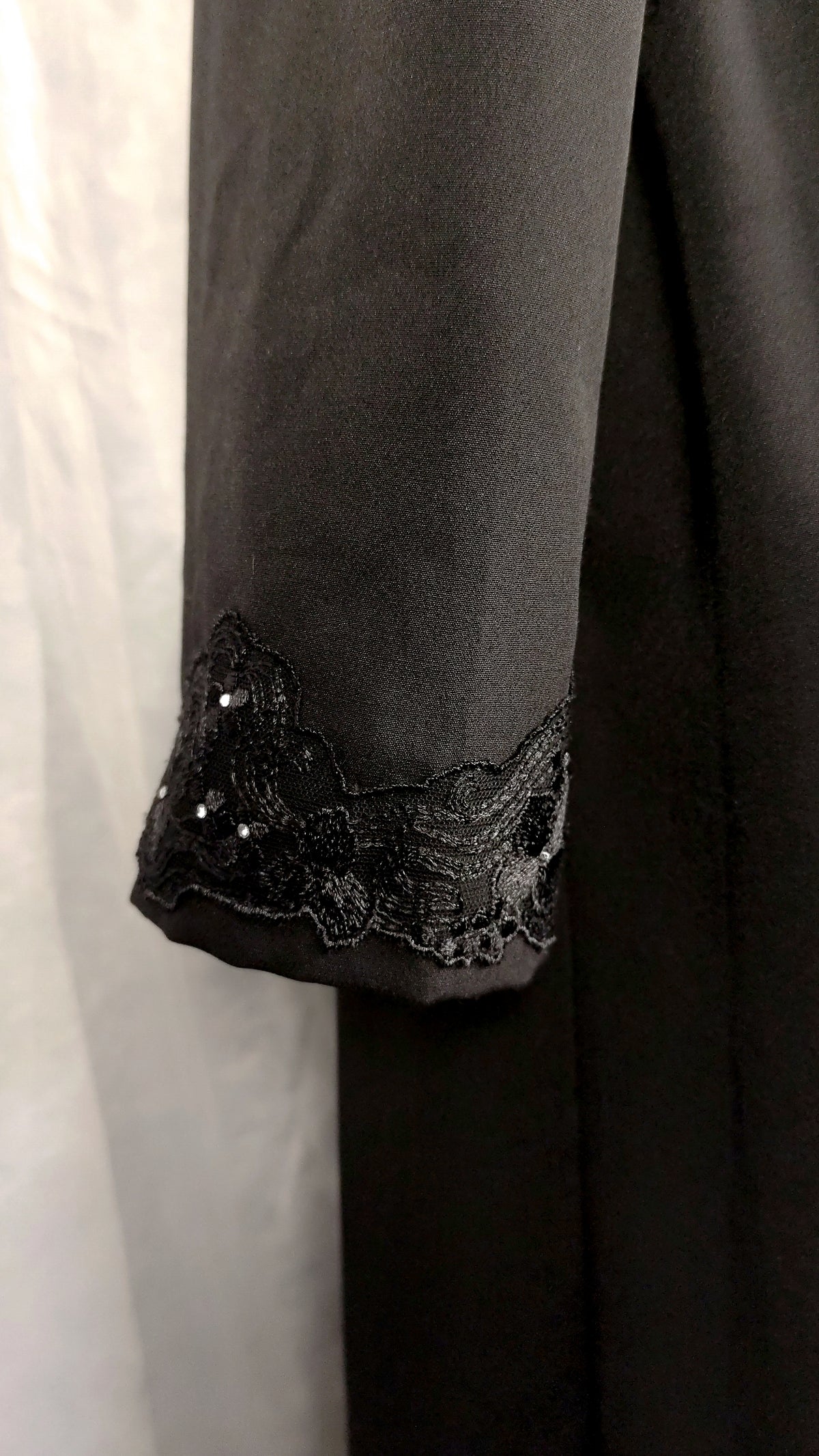 Close-up of lace trim cuff