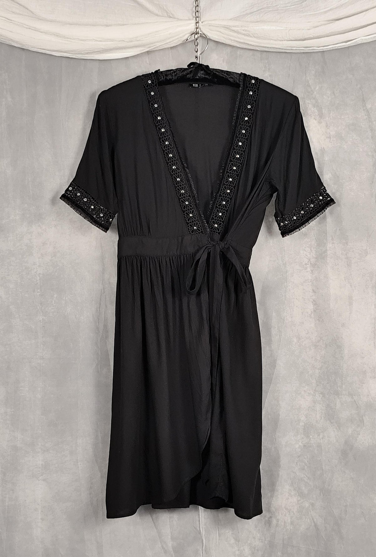 Alternative black wrap dress with studs, velvet and tulle details. 